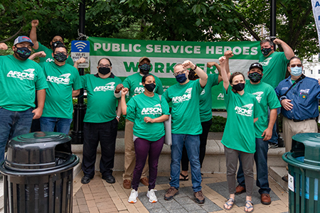 Arlington County workers celebrate the expansion of workplace rights