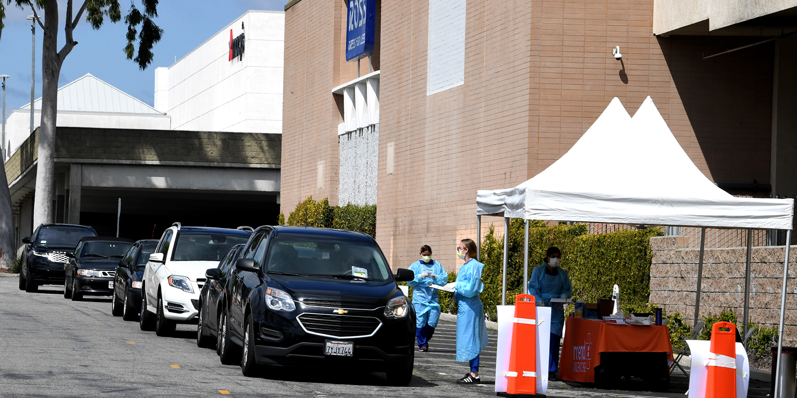 ‘This is what we are called to do’: Inside a Drive-Up COVID-19 Testing Facility