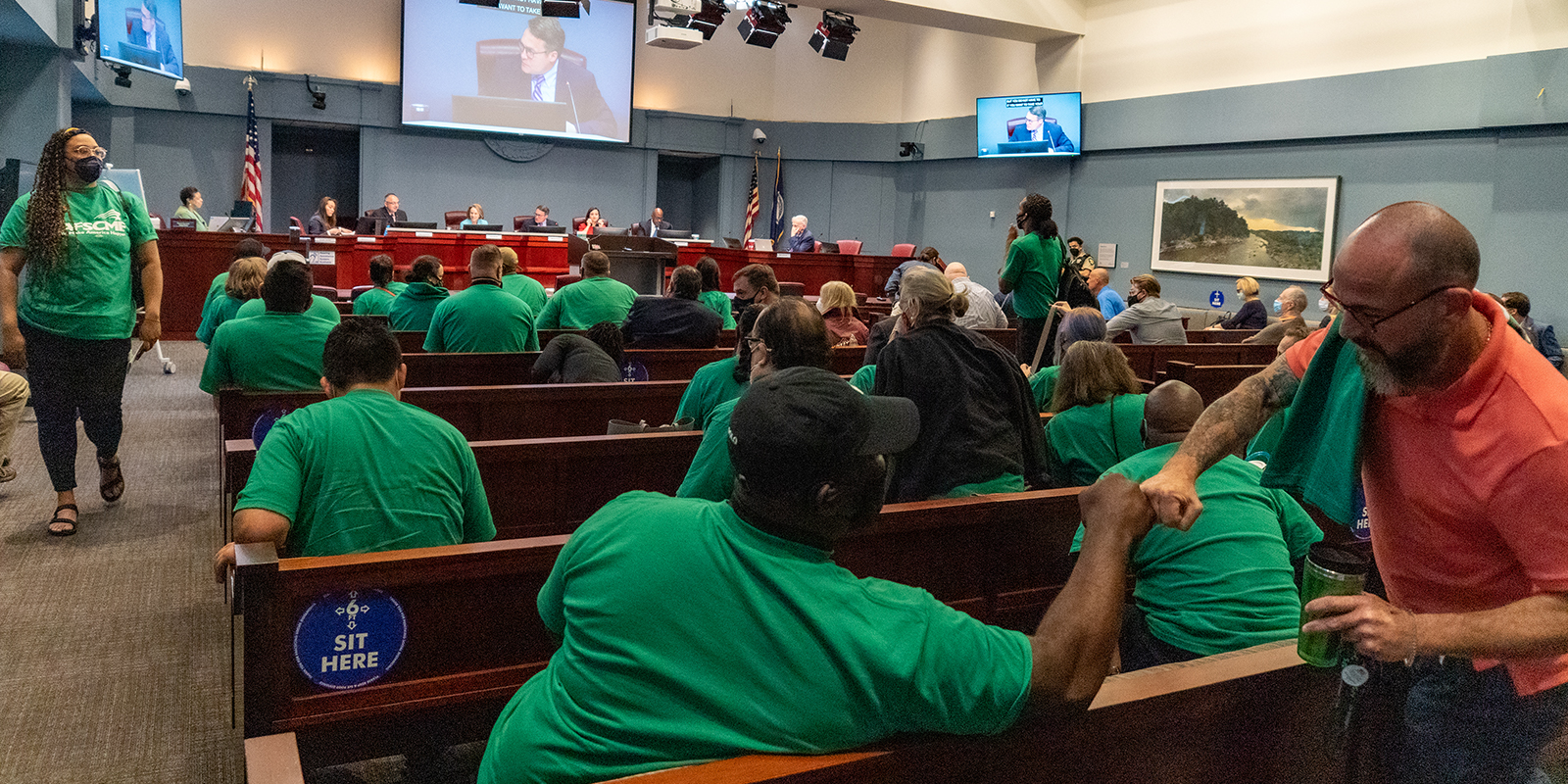 Arlington County workers celebrate the expansion of workplace rights 